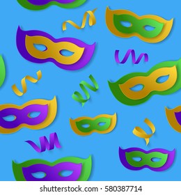 Seamless pattern with green, yellow, violet paper mask and serpentine, ribbon on blue backgound. Vector illustration. Mardi Gras elements for banner, holiday, party.