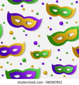 Seamless pattern with green, yellow, violet paper mask and balls on white backgound. Vector illustration. Mardi Gras elements for banner, holiday, party.