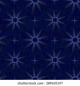 Seamless pattern of grey and black circle shapes on a dark  blue background.