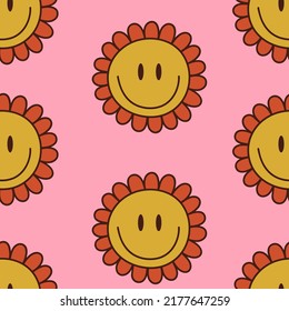 Seamless pattern with groovy daisy smile. 1970 style. Vector illustration