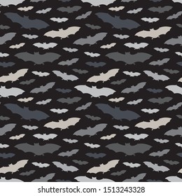 Seamless pattern with a group of bat. Halloween holiday background. Vampire silhouettes print. Trick or treat wallpaper. Kids scrapbook digital paper, textile print, page fill. Vector illustration