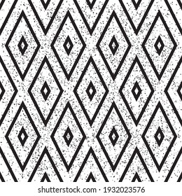 Seamless pattern with grunge black rhombuses
