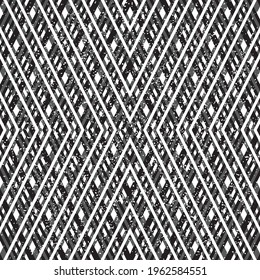 Seamless pattern with grunge black and white interlace intersecting stripes.eps