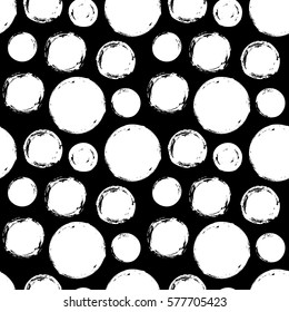 Seamless pattern with grunge circles. Geometric graphic design element. Black white hand painted brush stroke texture. Hand drawn round shapes background. Vector illustration.