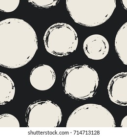 Seamless pattern with grunge circles. Hand drawn round shapes background. Black white brush stroke texture. Geometric graphic design element. Scrapbook wallpaper. Vector illustration