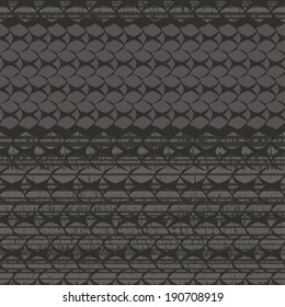 Seamless pattern with grunge tire tracks. Vector abstract background.