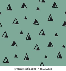 Seamless pattern with grunge triangles