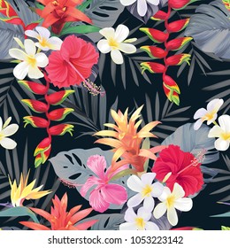 Seamless pattern with guzmania flower, bird of paradise, hibiscus and palm leaves on black background. Vector set of blooming tropical floral for wedding invitations, greeting card and fashion design.