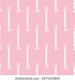 seamless pattern with hairpins isolated on pink background.