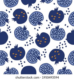 Seamless pattern of half and whole pomegranate fruits in blue. Vector illustration on white background. 

