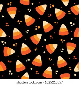 Seamless pattern for Halloween - Candy corn on black backgound. Good for wrapping paper, textile print, wall paper, poster, card or decoration.