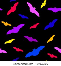 Seamless pattern for Halloween with color bats. Vector background.