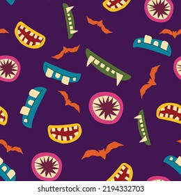 Seamless pattern for Halloween with color scary fun monster mouth on dark purple background.  