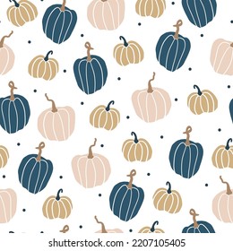 Seamless pattern for Halloween. cute colored pumpkins and dots on a white background. vector texture. fashionable print for textiles, wallpaper and packaging.