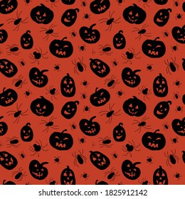 Seamless pattern for Halloween. Silhouettes of pumpkins on a black background. Design for fabric, wallpaper, packaging.
