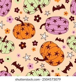 Patrón sin fisuras tema de halloween de calabaza, murciélago, estrella y floral. Patrón para tela y papel de embalaje, patrón para el Fondo de pantalla de diseño y estampados de moda.