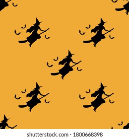 Seamless pattern for Halloween with witch black silhouette on broomstick on orange background