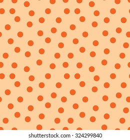 Seamless pattern. Halloween's pattern. Orange circles in a chaotic manner on pastel background. Vector EPS10