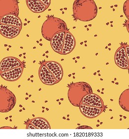 Seamless pattern of halves of pomegranate in pastel colors. Vector illustration in a flat style.
