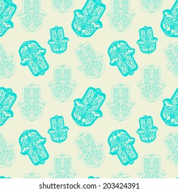 Seamless pattern with hamsa hand.