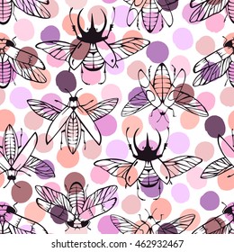 Seamless pattern with hand drawn beetles on a polka dot background.