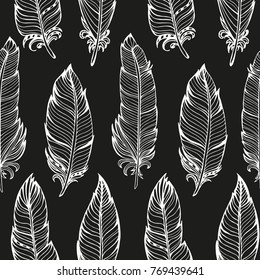 Seamless pattern. Hand drawn bird black feathers on black background. Vector illustration