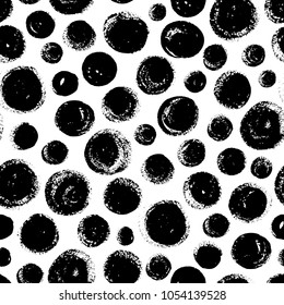 Seamless pattern with hand drawn black circles. Ink illustration. Rough edges. Ornament for wrapping paper.