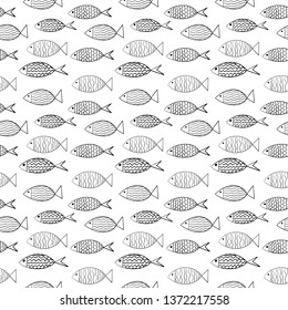 Seamless pattern with hand drawn black contour fish on white background. Marine life vector wrapping paper. Underwater animals fabric design. Black and white illustration.