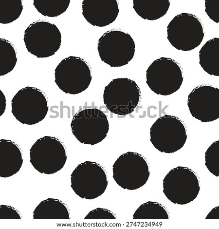 A seamless pattern of hand drawn black polka dots on a white background, featuring a grunge texture for a bold, artistic, and modern design.