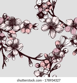 Seamless pattern with hand drawn  blooming fruit tree twig. Vector vintage spring  background 