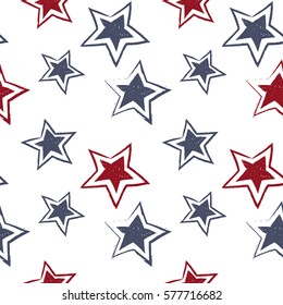 Seamless pattern of hand drawn blue and red stars on white background