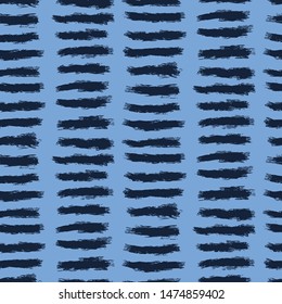 Seamless pattern. Hand drawn broken stripes background. Monochrome textured brush stroke indigo blue all overprint swatch