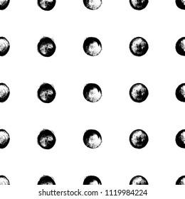 Seamless pattern of hand drawn brush spots and splashes, ink and paint textures design elements. Black grungy circles isolated on white. Vector Illustration EPS 10 file.
