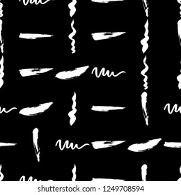 Seamless pattern hand drawn with a brush strokes. Abstract black and white paint brushstrokes vector illustration. Grunge monochrome background. Good for web, print, textile and wrapping paper.