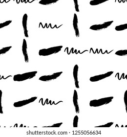Seamless pattern hand drawn with a brush strokes. Abstract black and white paint brushstrokes vector illustration. Grunge monochrome background. Good for web, print, textile and wrapping paper.