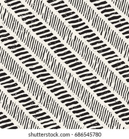 Seamless pattern with hand drawn brush strokes. Ink doodle grunge illustration. Geometric monochrome vector pattern.