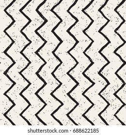 Seamless pattern with hand drawn brush strokes. Ink doodle grunge illustration. Geometric monochrome vector pattern.