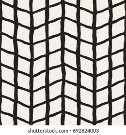 Seamless pattern with hand drawn brush strokes. Ink doodle grunge illustration. Geometric monochrome vector pattern.