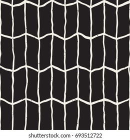 Seamless pattern with hand drawn brush strokes. Ink doodle grunge illustration. Geometric monochrome vector pattern.