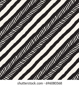 Seamless pattern with hand drawn brush strokes. Ink doodle grunge illustration. Geometric monochrome vector pattern.