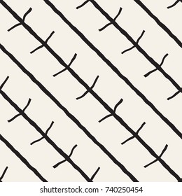 Seamless pattern with hand drawn brush strokes. Ink doodle grunge illustration. Geometric monochrome vector pattern.