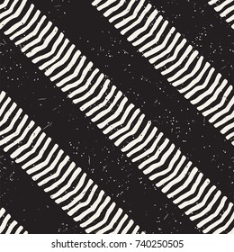 Seamless pattern with hand drawn brush strokes. Ink doodle grunge illustration. Geometric monochrome vector pattern.