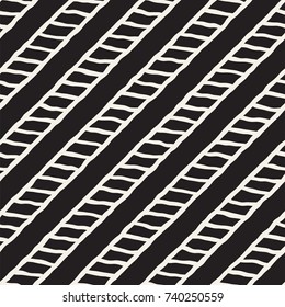 Seamless pattern with hand drawn brush strokes. Ink doodle grunge illustration. Geometric monochrome vector pattern.