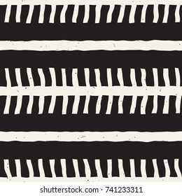Seamless pattern with hand drawn brush strokes. Ink doodle grunge illustration. Geometric monochrome vector pattern.