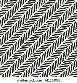 Seamless pattern with hand drawn brush strokes. Ink doodle grunge illustration. Geometric monochrome vector pattern.