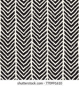 Seamless pattern with hand drawn brush strokes. Ink doodle grunge illustration. Geometric monochrome vector pattern.