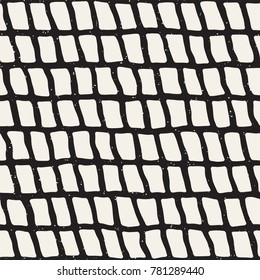 Seamless pattern with hand drawn brush strokes. Ink doodle grunge illustration. Geometric monochrome vector pattern.