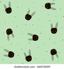 Seamless pattern with hand drawn bunny and dots on light green background 