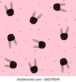Seamless pattern with hand drawn bunny and dots on pink background 