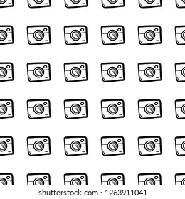 Seamless pattern Hand Drawn camera doodle. Sketch style icon. Decoration element. Isolated on white background. Flat design. Vector illustration.